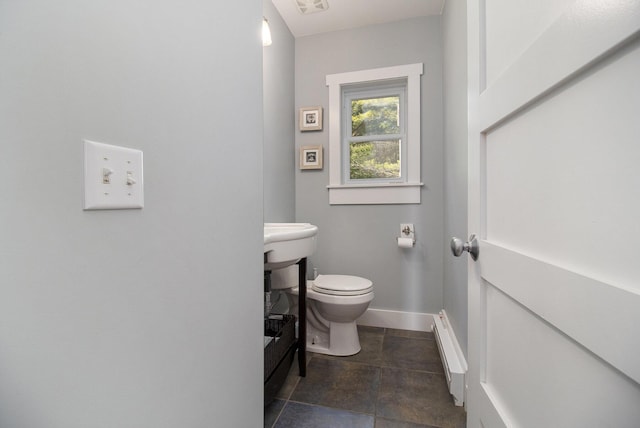 2177 S Lakeshore Dr, Ludington, MI 49431 - bathroom with toilet and baseboards