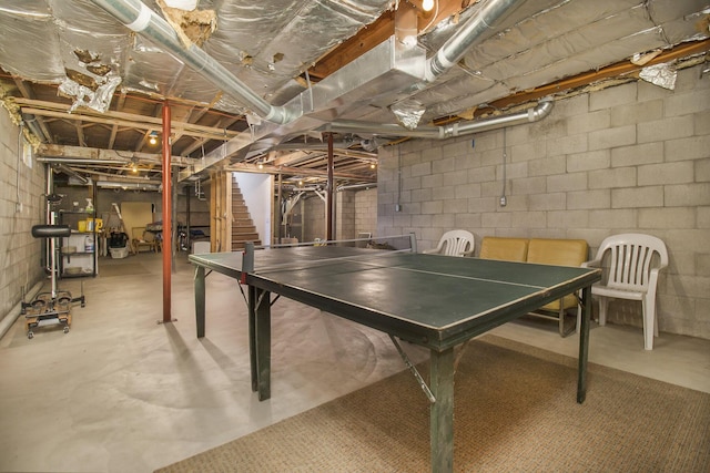 2177 S Lakeshore Dr, Ludington, MI 49431 - rec room with concrete floors and concrete block wall