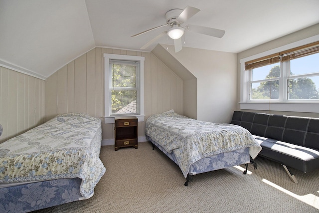 2177 S Lakeshore Dr, Ludington, MI 49431 - carpeted bedroom with lofted ceiling and ceiling fan