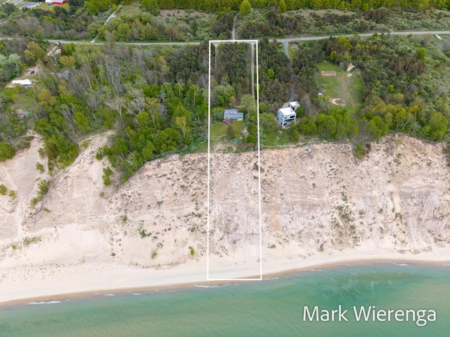2177 S Lakeshore Dr, Ludington, MI 49431 - aerial view of property and surrounding area featuring property parcel outlined and extended coastline