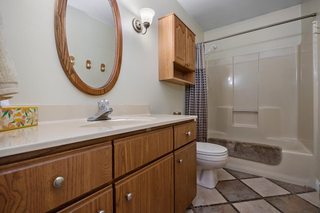 bathroom with toilet, vanity, and shower / bath combo
