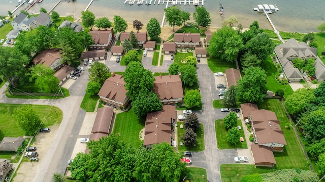 5410 Country Aire Dr Unit 14, Coloma, MI 49038 - aerial view of property and surrounding area featuring nearby suburban area and a large body of water
