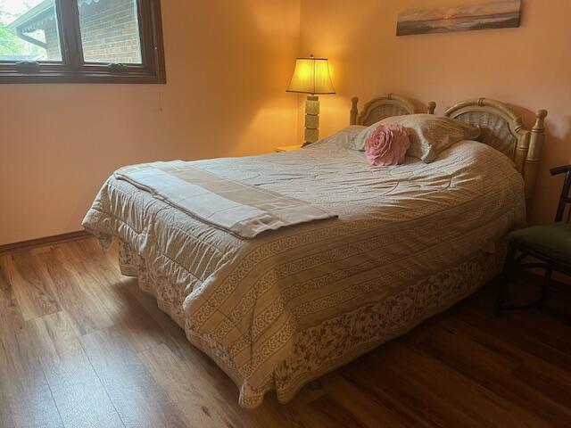 5410 Country Aire Dr Unit 14, Coloma, MI 49038 - bedroom featuring wood finished floors and baseboards
