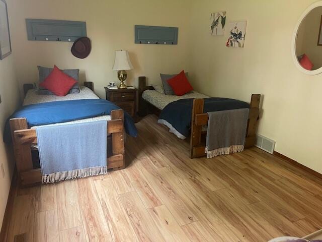 5410 Country Aire Dr Unit 14, Coloma, MI 49038 - bedroom with wood finished floors and baseboards
