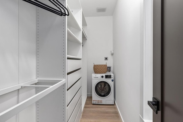 3500 Lakeshore Dr, Saint Joseph, MI 49085 - laundry room with washer / dryer and light wood-style floors