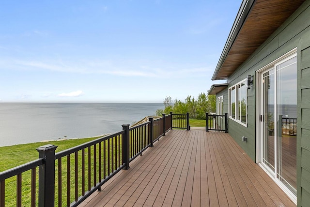 3500 Lakeshore Dr, Saint Joseph, MI 49085 - wooden deck featuring a water view and a lawn