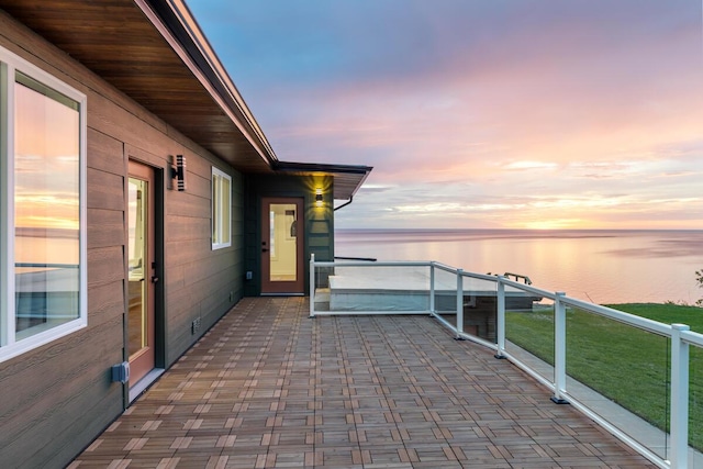 3500 Lakeshore Dr, Saint Joseph, MI 49085 - patio terrace at dusk featuring a water view and a balcony