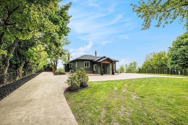 3500 Lakeshore Dr, Saint Joseph, MI 49085 - view of front of home featuring concrete driveway and cooling unit