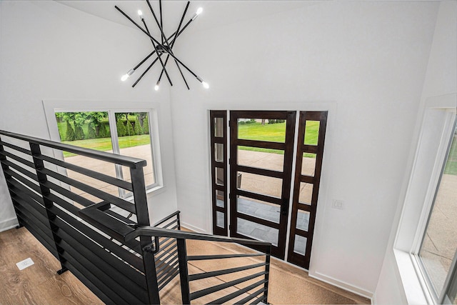 3500 Lakeshore Dr, Saint Joseph, MI 49085 - foyer with a chandelier and baseboards