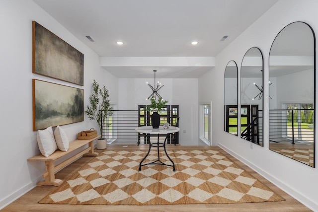 3500 Lakeshore Dr, Saint Joseph, MI 49085 - sitting room featuring a chandelier, recessed lighting, light wood-type flooring, and baseboards