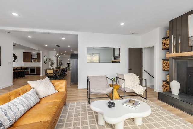 3500 Lakeshore Dr, Saint Joseph, MI 49085 - living room featuring light wood-style floors, recessed lighting, baseboards, and wine cooler