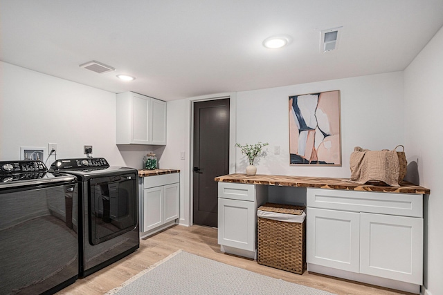 3500 Lakeshore Dr, Saint Joseph, MI 49085 - clothes washing area featuring separate washer and dryer, cabinet space, light wood finished floors, an office area, and recessed lighting