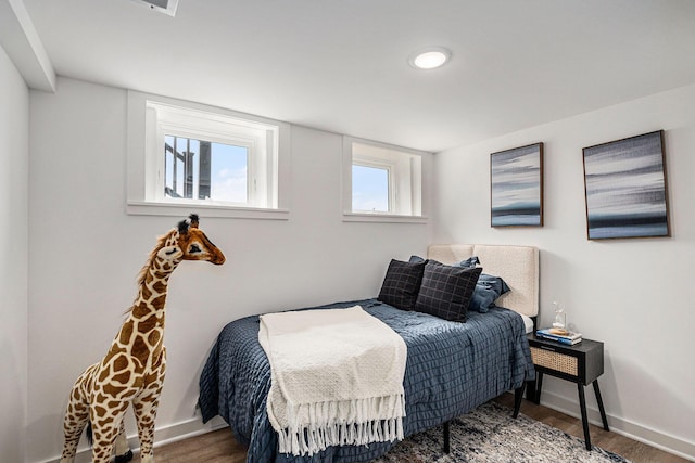 3500 Lakeshore Dr, Saint Joseph, MI 49085 - bedroom featuring wood finished floors and baseboards