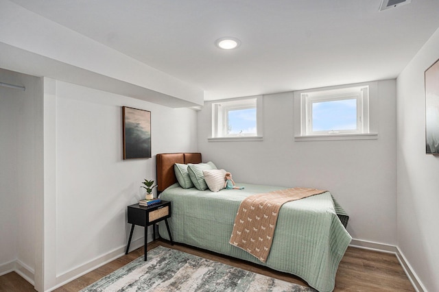 3500 Lakeshore Dr, Saint Joseph, MI 49085 - bedroom with wood finished floors, baseboards, and recessed lighting