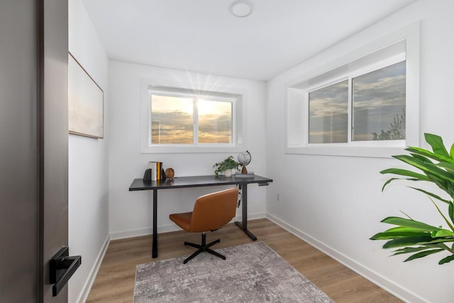 3500 Lakeshore Dr, Saint Joseph, MI 49085 - home office with light wood-style floors and baseboards