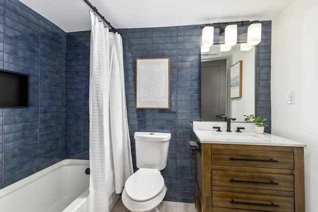 3500 Lakeshore Dr, Saint Joseph, MI 49085 - bathroom with vanity, toilet, shower / bath combo, and tile walls