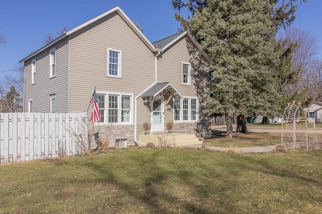 2106 Forest, Portage, MI 49002 - rear view of property featuring stone siding