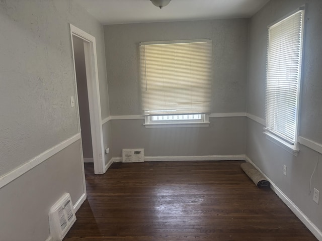 20100 Wexford St, Detroit, MI 48234 - spare room with plenty of natural light, wood finished floors, and baseboards