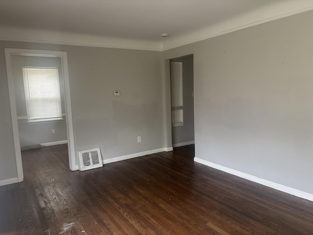 20100 Wexford St, Detroit, MI 48234 - spare room featuring wood finished floors, crown molding, and baseboards