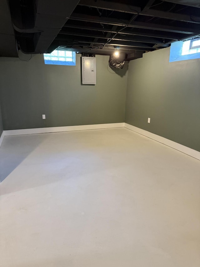 below grade area featuring plenty of natural light and electric panel