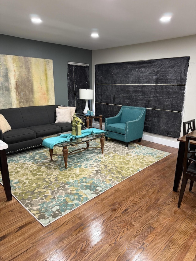 living room featuring wood finished floors and recessed lighting