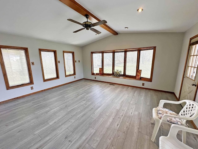 2565 Carleton Rockwood Rd, Carleton, MI 48117 - unfurnished living room with light wood-style flooring, baseboards, and ceiling fan