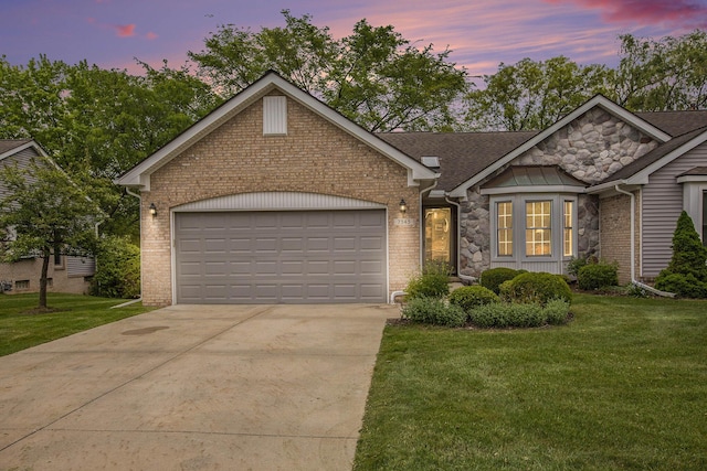 7343 Green Meadow Ln, Canton, MI 48187 - view of front of property with stone siding, concrete driveway, an attached garage, and a front lawn