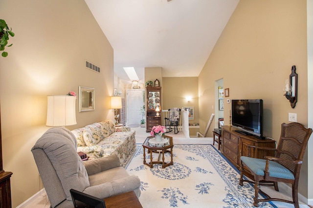 7343 Green Meadow Ln, Canton, MI 48187 - carpeted living area featuring high vaulted ceiling, baseboards, and a skylight