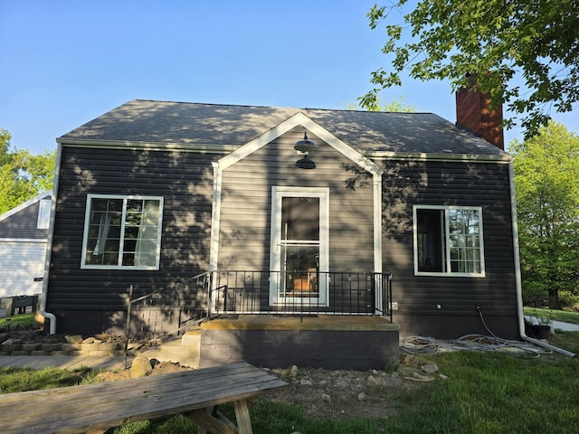 13851 Hillsdale Rd, Camden, MI 49232 - view of front of home featuring a chimney