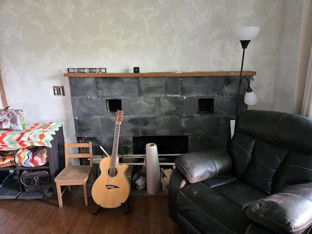13851 Hillsdale Rd, Camden, MI 49232 - detailed view of wood finished floors and a fireplace