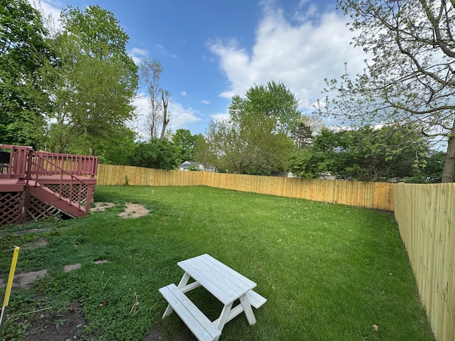 view of yard featuring a deck