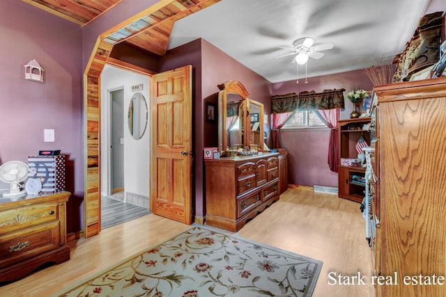 bathroom featuring a ceiling fan and wood finished floors