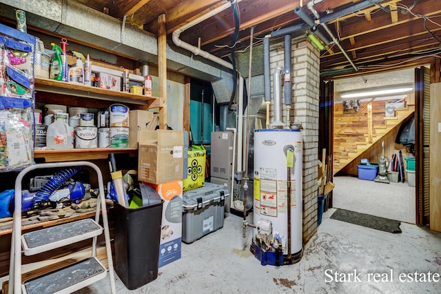 unfinished basement featuring gas water heater