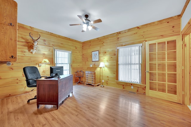 3118 Pratt Ln, Attica, MI 48412 - office space featuring ceiling fan, light wood-style flooring, and wooden walls