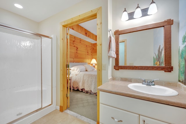 3118 Pratt Ln, Attica, MI 48412 - ensuite bathroom with a shower stall, tile patterned floors, and vanity