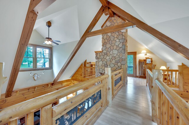 3118 Pratt Ln, Attica, MI 48412 - hallway with plenty of natural light, an upstairs landing, wood finished floors, and high vaulted ceiling
