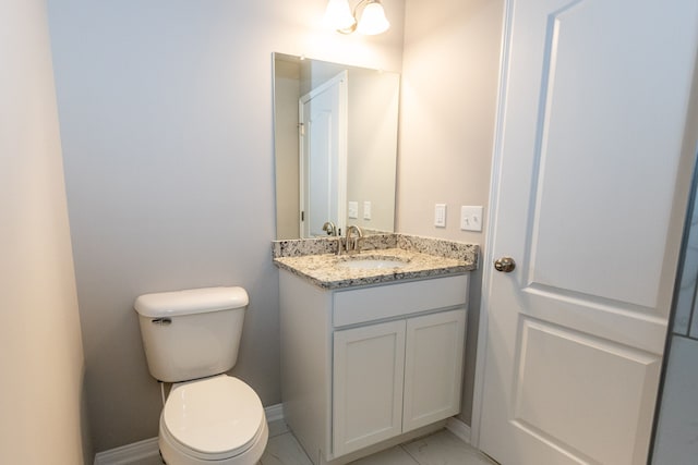 33806 Au Sable Dr, Chesterfield, MI 48047 - bathroom with toilet, vanity, and baseboards