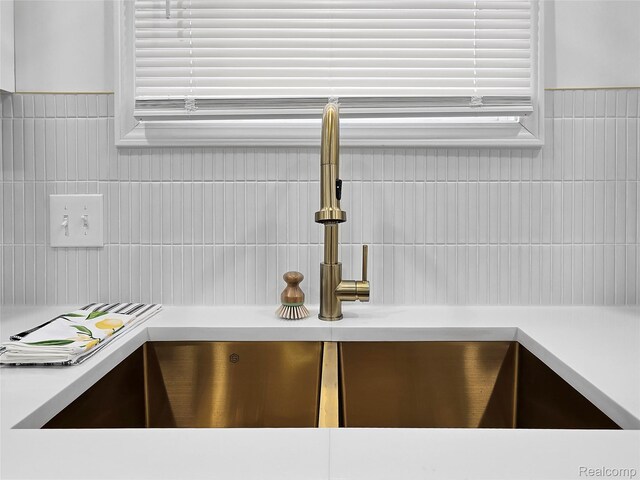 17524 Woodingham Dr, Detroit, MI 48221 - kitchen view of a sink, light countertops, and tile walls