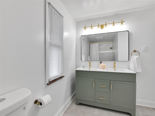 17524 Woodingham Dr, Detroit, MI 48221 - full bath with baseboards, double vanity, tile patterned flooring, and toilet
