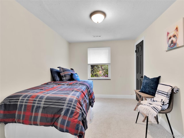 17524 Woodingham Dr, Detroit, MI 48221 - carpeted bedroom featuring baseboards and a textured ceiling
