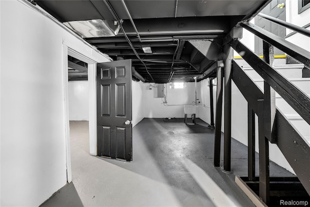 17524 Woodingham Dr, Detroit, MI 48221 - basement with electric panel, stairs, and a sink