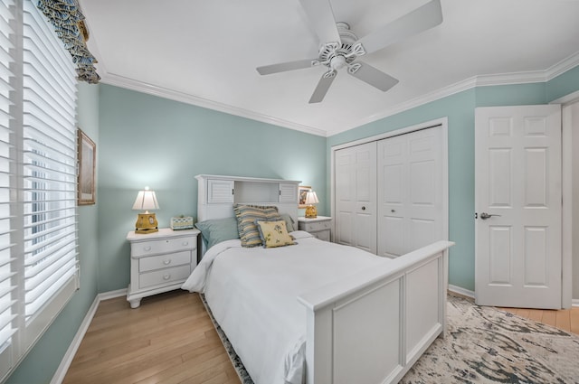 3123 Fairgrove Ter, Rochester Hills, MI 48309 - bedroom with light wood finished floors, baseboards, a closet, ornamental molding, and a ceiling fan