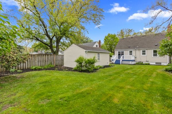 view of yard with a wooden deck