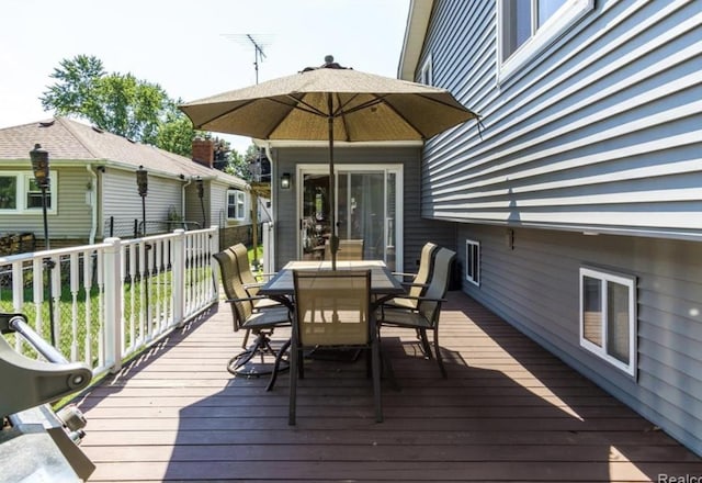 12147 Torrey Rd, Fenton, MI 48430 - wooden terrace with outdoor dining space