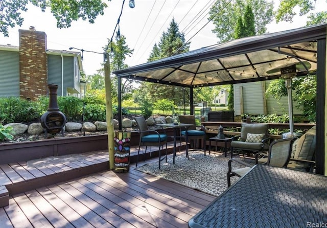 12147 Torrey Rd, Fenton, MI 48430 - wooden deck featuring a gazebo and outdoor lounge area
