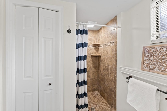 12147 Torrey Rd, Fenton, MI 48430 - bathroom featuring a closet and a stall shower