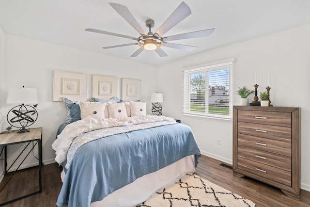 12147 Torrey Rd, Fenton, MI 48430 - bedroom featuring wood finished floors, baseboards, and ceiling fan