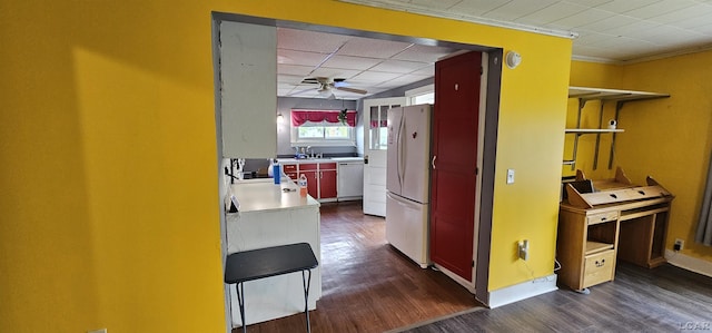 10320 Springville Hwy, Onsted, MI 49265 - corridor with dark wood finished floors, a sink, and baseboards