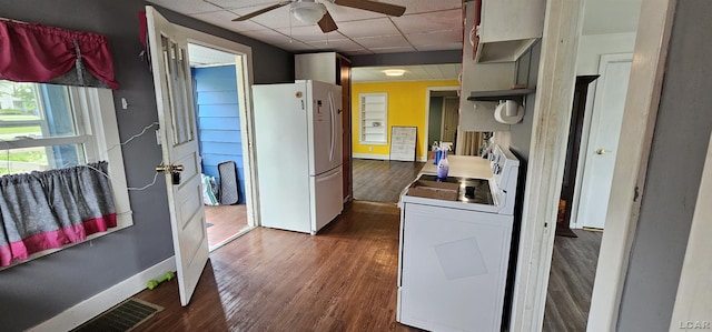 10320 Springville Hwy, Onsted, MI 49265 - kitchen featuring white appliances, a paneled ceiling, a ceiling fan, dark wood-type flooring, and baseboards