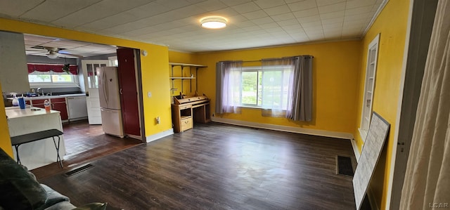 10320 Springville Hwy, Onsted, MI 49265 - living area featuring crown molding, dark wood-style flooring, baseboards, and ceiling fan